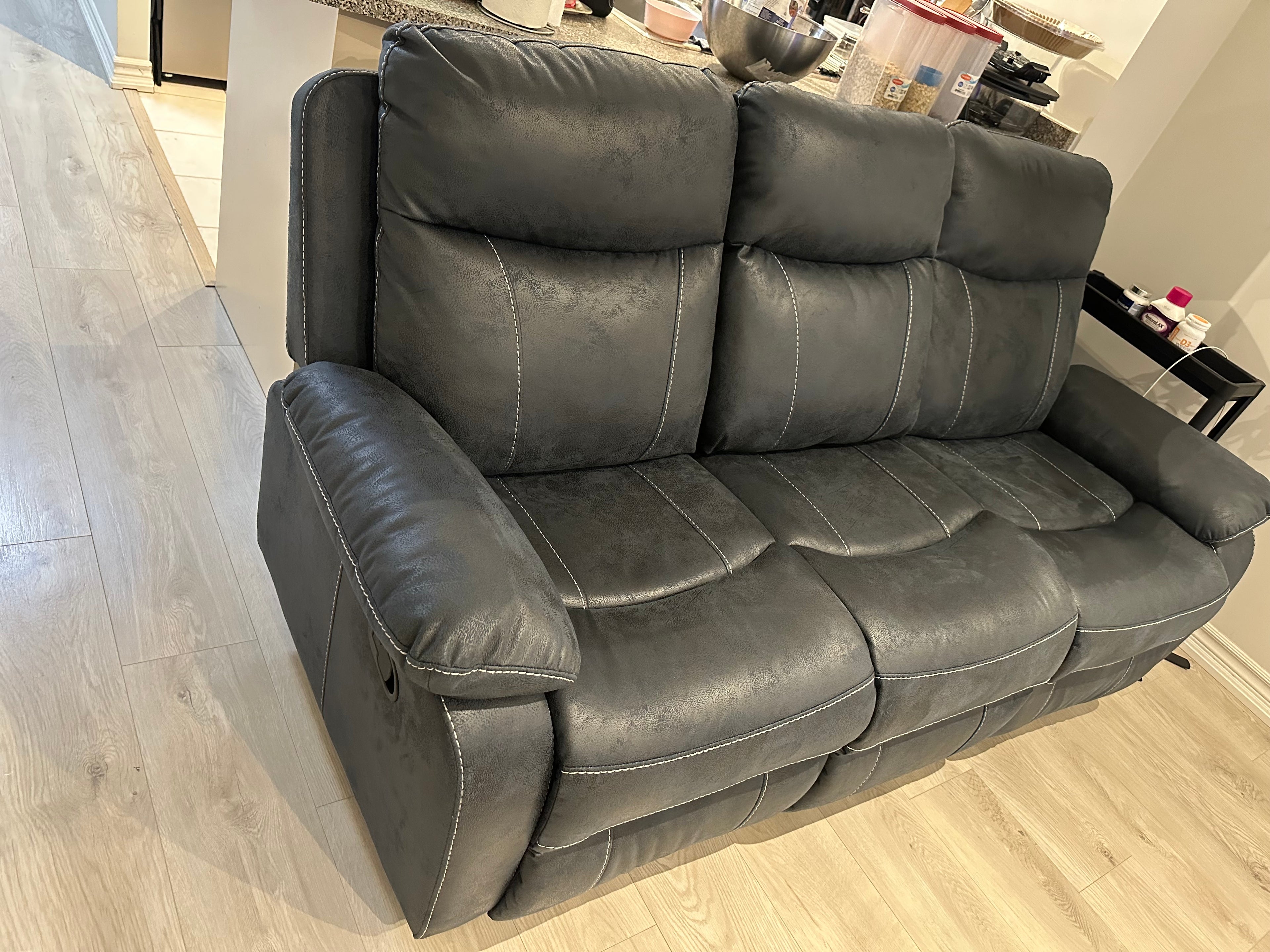 Reclining sofa with center console and 2 Cup holders