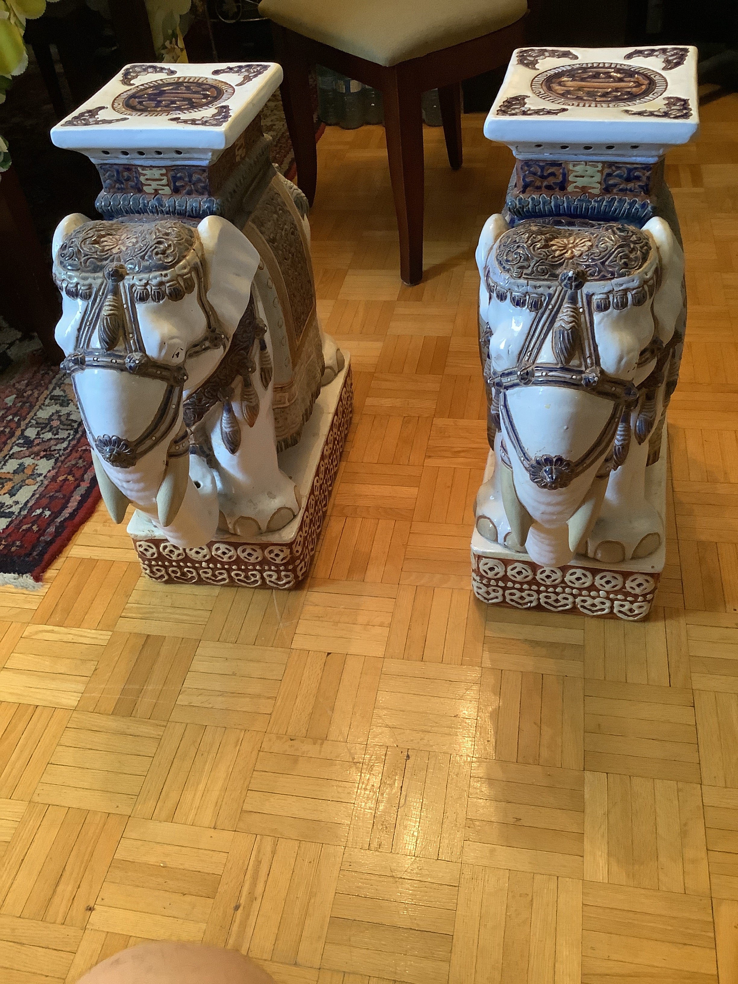 Pair of vintage ceramic elephants can be used as end tables