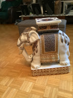 Pair of vintage ceramic elephants can be used as end tables