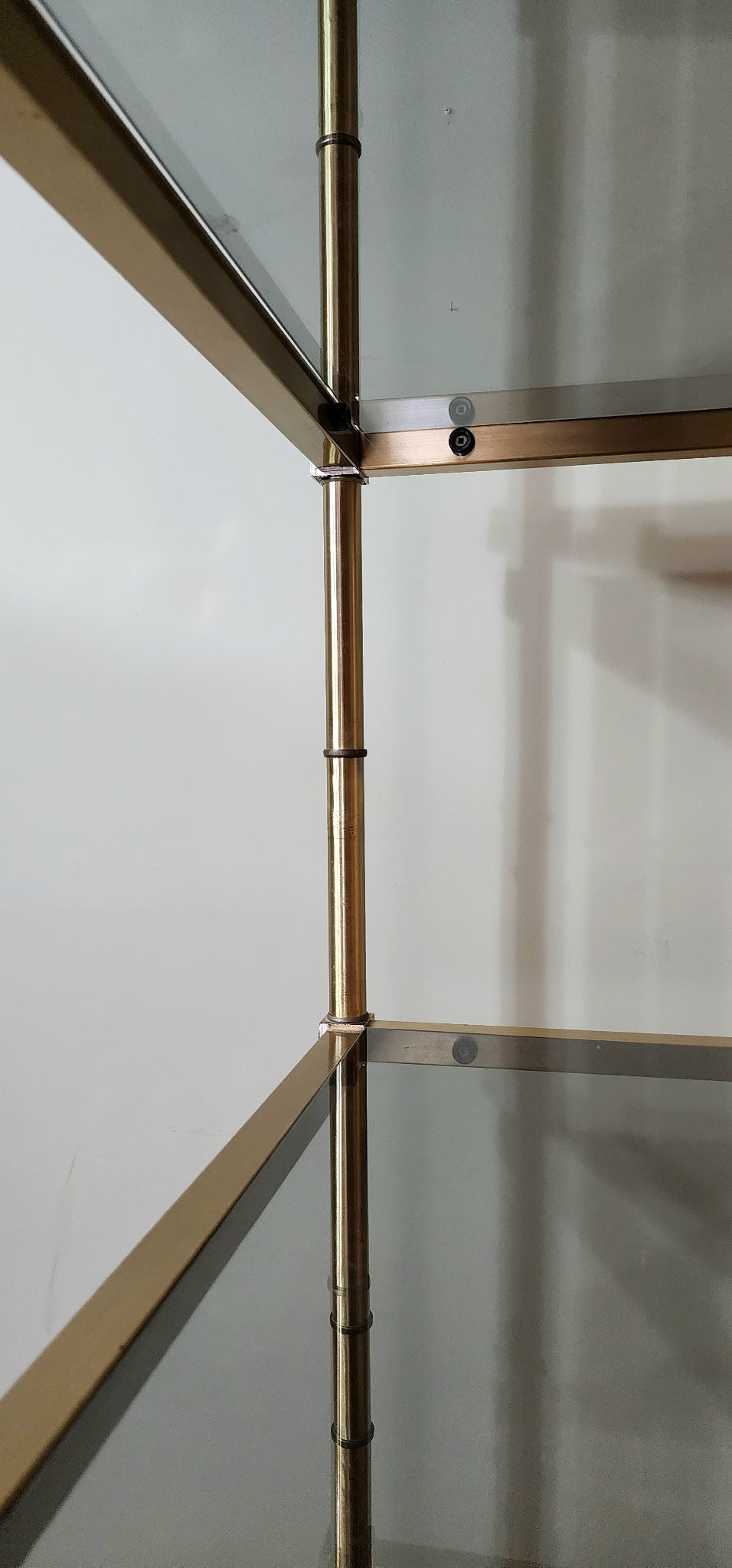 Hollywood Regency brass and smoked glass étagère