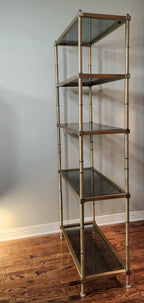 Hollywood Regency brass and smoked glass étagère