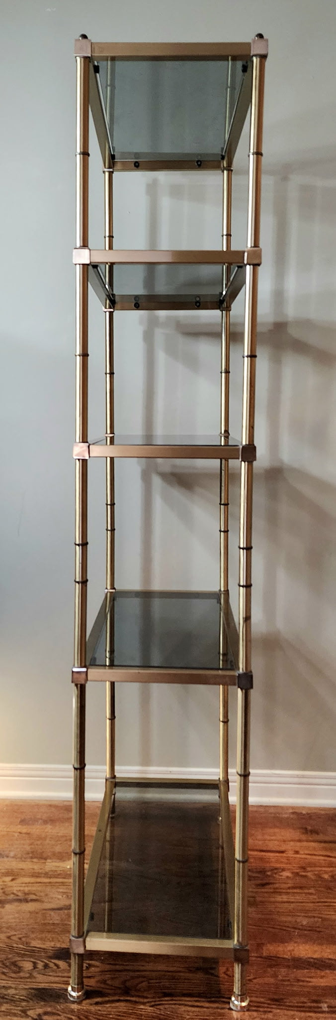 Hollywood Regency brass and smoked glass étagère