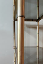 Hollywood Regency brass and smoked glass étagère