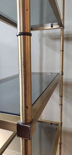 Hollywood Regency brass and smoked glass étagère
